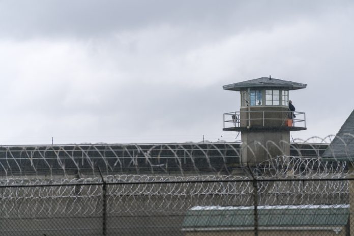 1056797345 featured image Guard tower and barbed wire at a prison facility