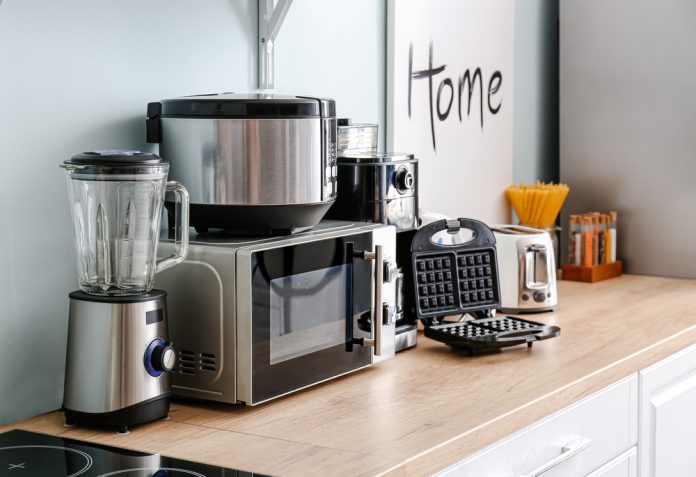 1929910904 featured image Kitchen appliances on a wooden countertop in kitchen