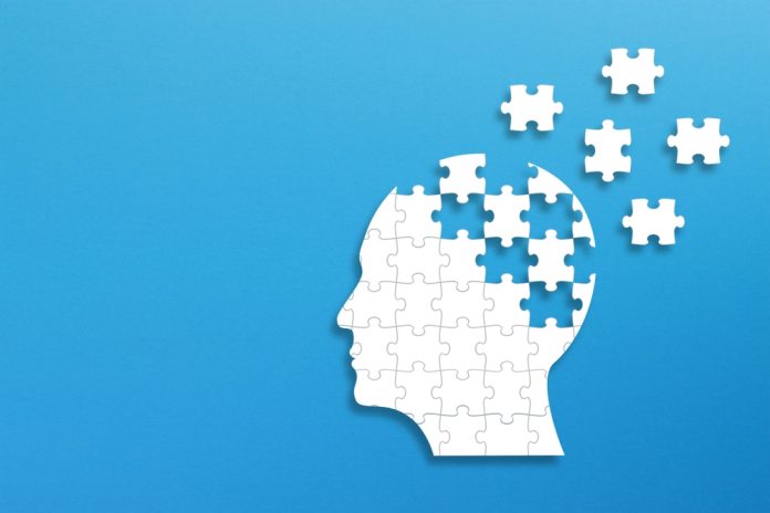 2538589953 featured image Silhouette head made of puzzle pieces on blue background