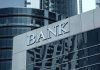 Bank building with reflective glass windows.