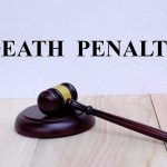 Gavel with Death Penalty text background.