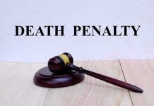 Gavel with Death Penalty text background.