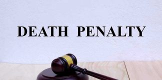 Gavel with Death Penalty text background.