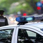 Suspect Outsmarts ENTIRE Police Dept – In Plain Sight! Police car and officer on a city street.