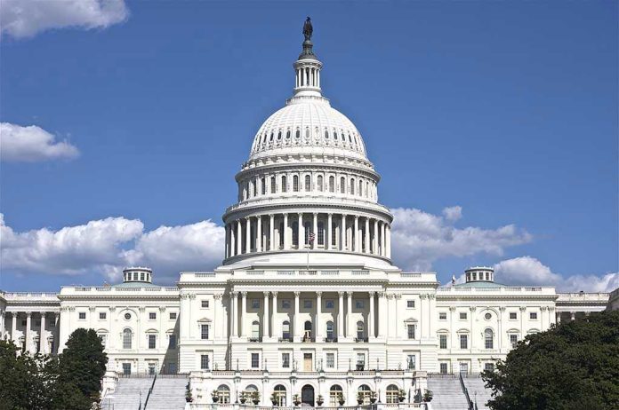 119536138 U.S. Capitol building against blue sky.