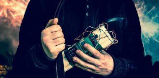 Explosive Attack – Suicide BOMBERS Strike! Person holding a homemade explosive device.