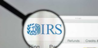 GOP Senator Caught in $5M Tax Scandal! Magnifying glass over IRS website.