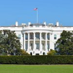 The White House with the American flag flying in front