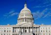 US Capitol Building against blue sky.