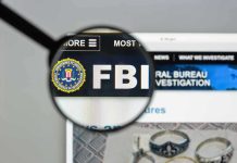 FBI Thwarts New Years Eve Bomb Plot- What They Find Sends Chills! FBI website shown through magnifying glass.