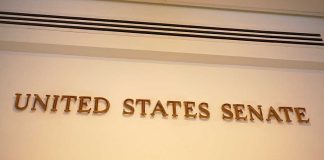 Senator Receives Pipe Bomb at Her Home! Sign displaying United States Senate in a government building