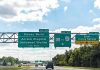 Disney MASSACRE – 3 Tourists Killed! Highway exit signs for Disney World attractions.