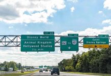 Highway exit signs for Disney World attractions.