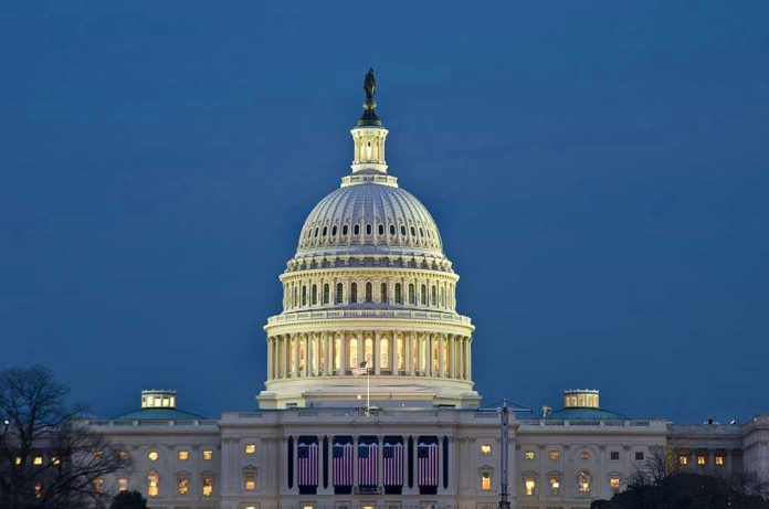 23264335 U.S. Capitol building illuminated at dusk.