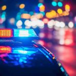 Church MASSACRE – Six People Killed, Including Priest Police car with flashing lights at night.