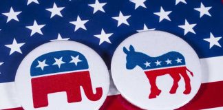 BUSTED: Democrats Caught Rigging Congressional Maps Early Republican elephant and Democrat donkey on American flag.