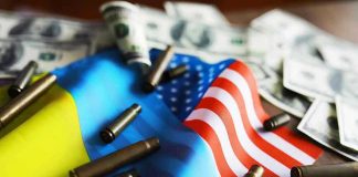 Flags, bullet casings, and dollar bills on table.