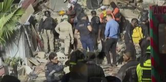 Teams work to find survivors in collapsed buildings after Venezuela earthquakes