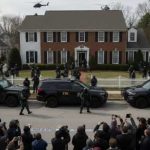 FBI agents and SWAT team outside a house during an operation