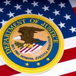 Department of Justice seal on American flag background