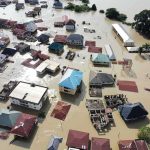 Aerial view of flooded residential neighborhood