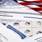 U.S. immigration and naturalization documents with American flag