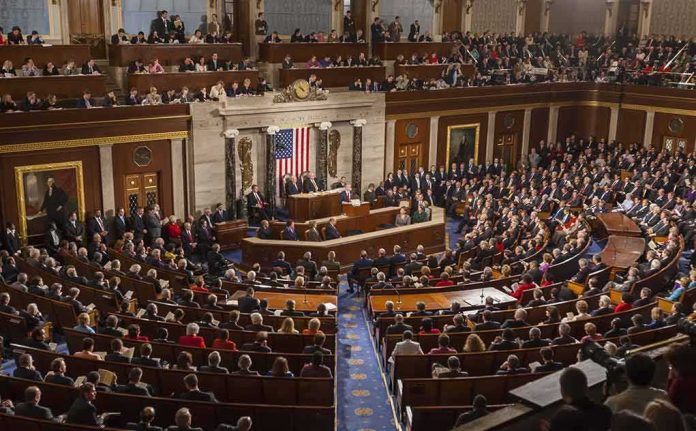 Legislative chamber filled with attendees during a formal address