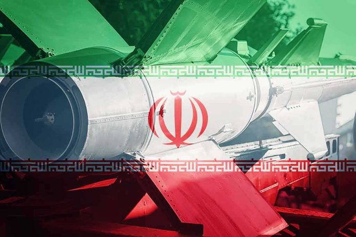 shutterstock_672102571 Iranian flag overlay on a missile with fins