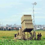 War Urgency TRUMPS Europe-First Rule Military defense system deployed in a field with soldiers nearby