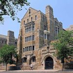 Plagiarism Storm Engulfs Cambridge Star Historic university building with stone facade and surrounding trees