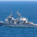 Shipping Lifeline Hit—What Did Trump Unleash? Gray naval warship cruising on open sea