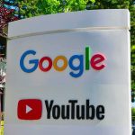 Judge Hammers Google — Monopoly Exposed Google and YouTube logos on an outdoor office sign