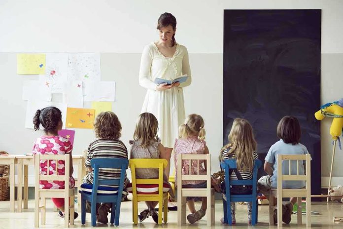 Teacher reading to children seated in a classroom