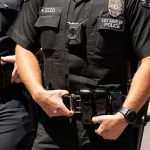 Edged Weapon Advance Triggers Fire Police officers in black uniforms with duty belts