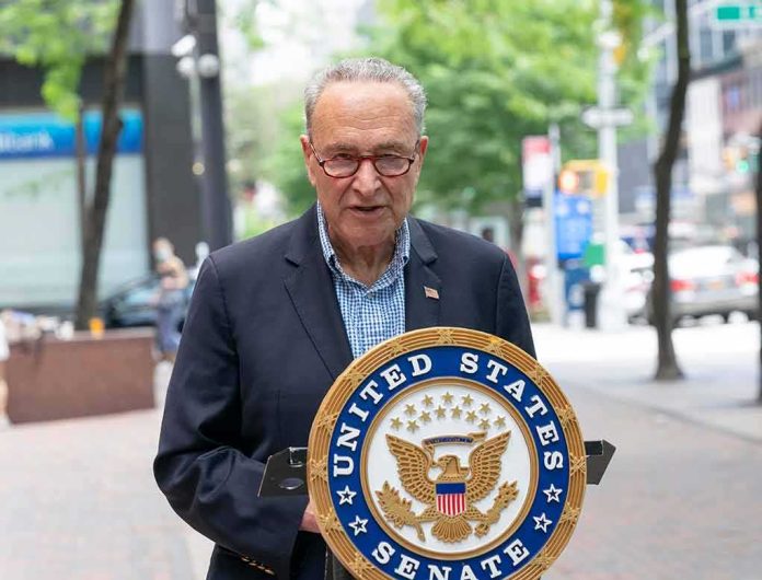 shutterstock_1765616111 man speaking at a podium with a United States Senate seal