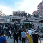 Deadly Odesa Strikes: Innocent Civilians Targeted Rescue workers and civilians on collapsed building after earthquake