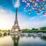 A Private Visit Shut Down The Eiffel Tower Eiffel Tower by the Seine with boats and spring blossoms