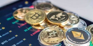 Stack of cryptocurrency coins on a trading app screen