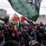 Palestine Flag UPROAR: Fans Ordered To Choose Dontrelle Inman and Christian Jones at a pro-Palestinian protest with flags waving