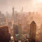 City skyline in warm haze at sunset