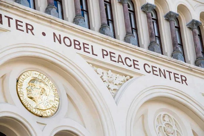 Nobel Peace Center facade with arched windows and gold medallion