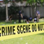 Queens Park Chaos—Cameras Hold Clues crime scene tape cordoning off a grassy area