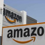 Amazon sign at a modern corporate building