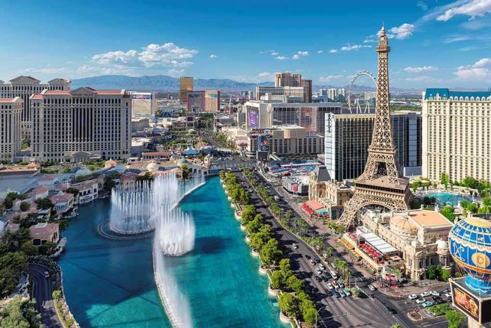 Las Vegas Strip skyline with fountains and Eiffel Tower replica