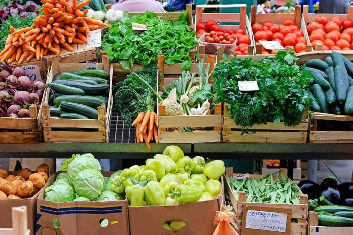 shutterstock_74858629 Fresh vegetables displayed at a market stall