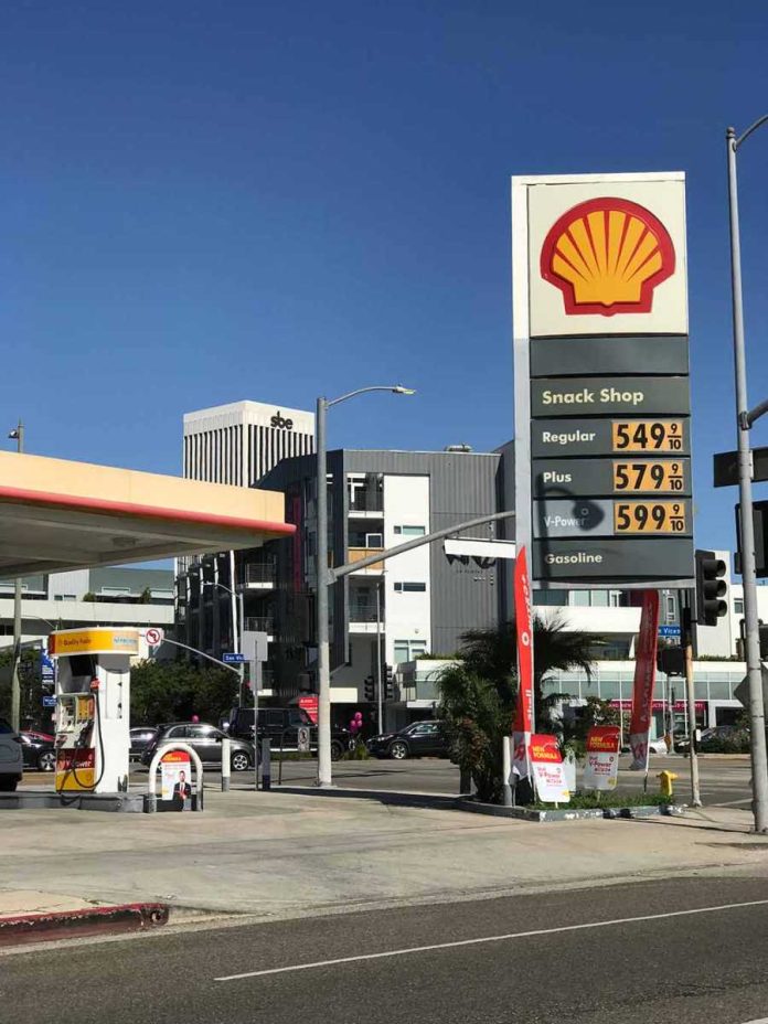 shutterstock_1543305896 Shell gas station with price sign on a sunny day