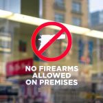 ICE Kill Plot Talk – Attorney Nabbed Next Day No firearms allowed sign on a store window