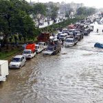 San Juan River ERUPTS – Evacuations Ignite Flooded city street with stranded vehicles and traffic jam
