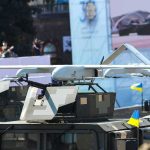 Russia’s New Drones Are Breaking Through Military drone mounted on armored vehicle