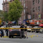 Back-Alley Jab Terrifies Fifth Avenue Police investigate a taped-off urban street crime scene
